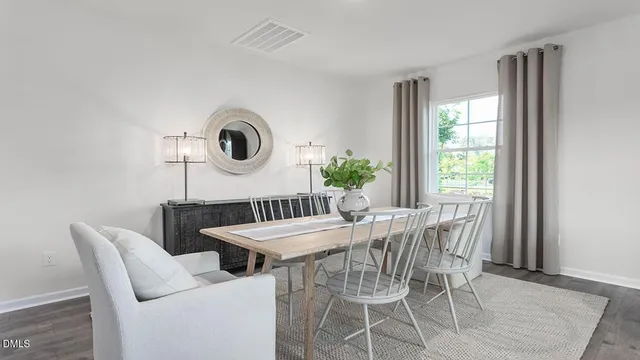 a living room with furniture and window