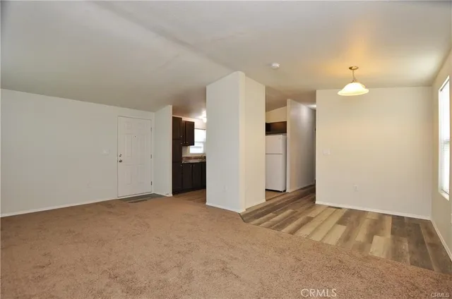 an empty room with a bathroom