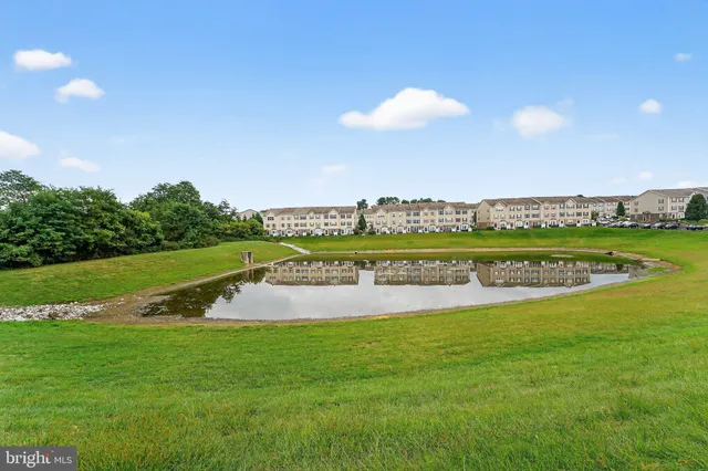 a view of a golf course with a lake