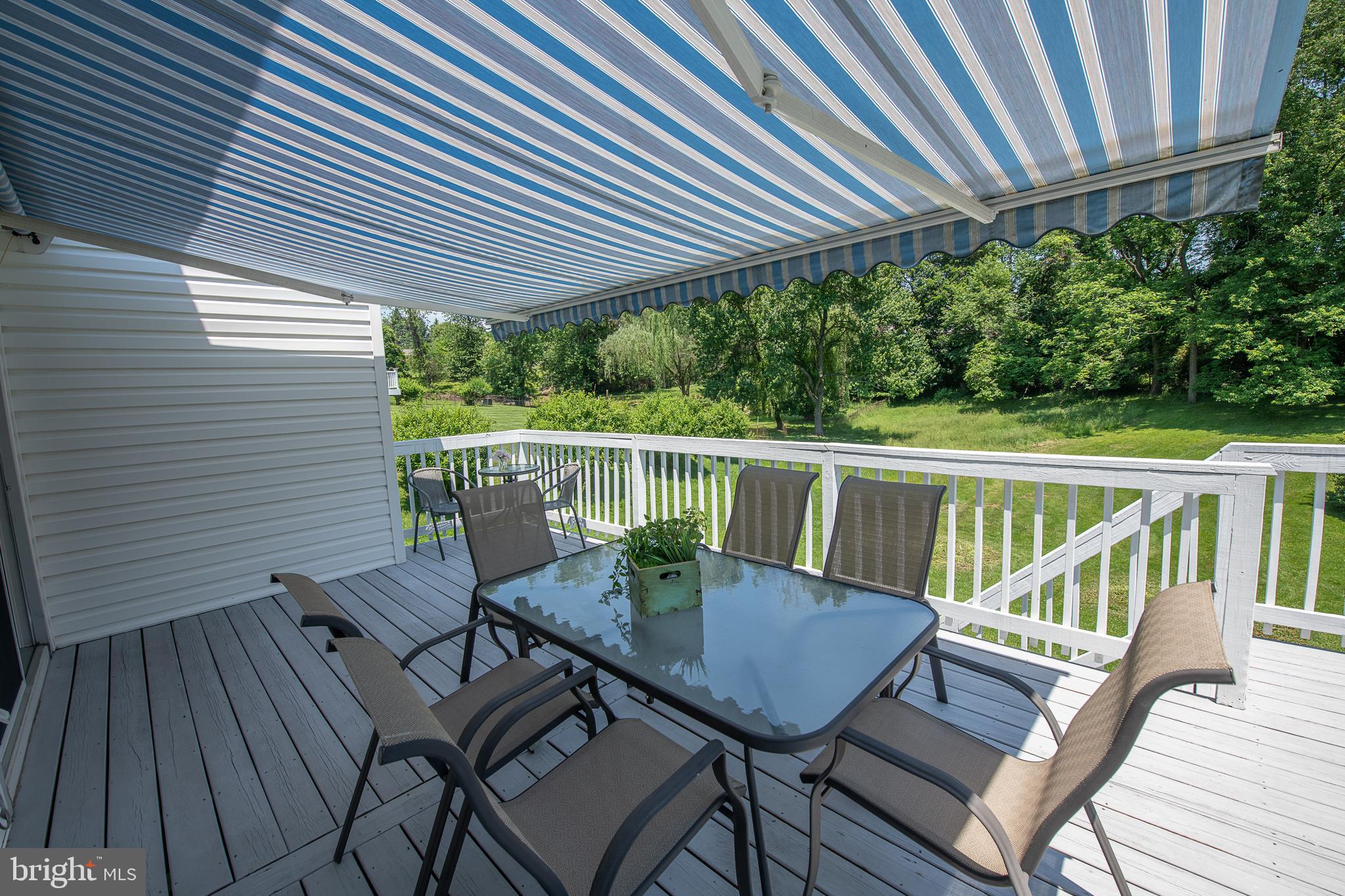 612 Barry Drive Springfield, PA 19064 - Photo 41 of 47 Rear deck with retractable awning