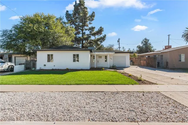 a house view with a garden space
