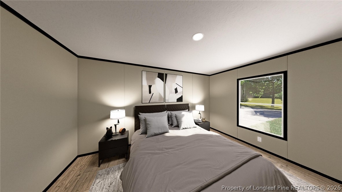 11 Belford Church Road Jackson Springs, NC 27281 - Photo 10 of 10 a bedroom with a bed and window