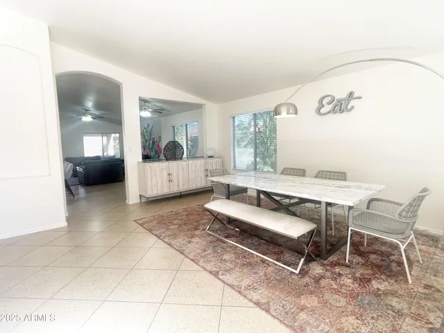 a living room with a couch and a table