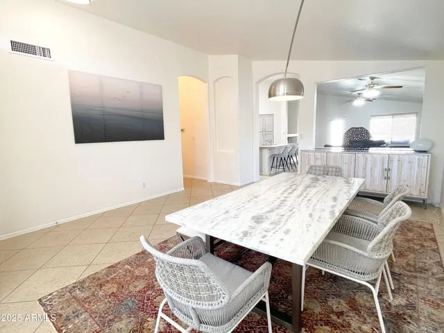 a living room with dining room