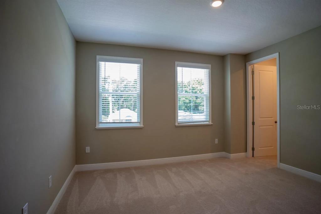 1676 Andover Rdg Drive DeLand, FL 32720 - Photo 11 of 14 an empty room with windows