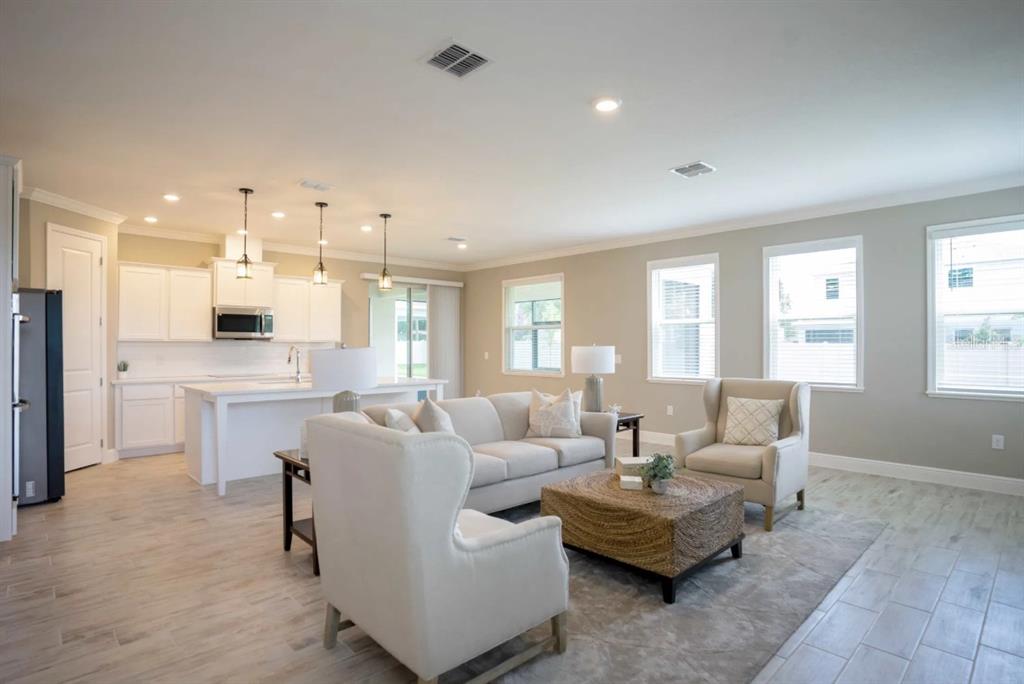 1676 Andover Rdg Drive DeLand, FL 32720 - Photo 5 of 14 a living room with furniture and a large window