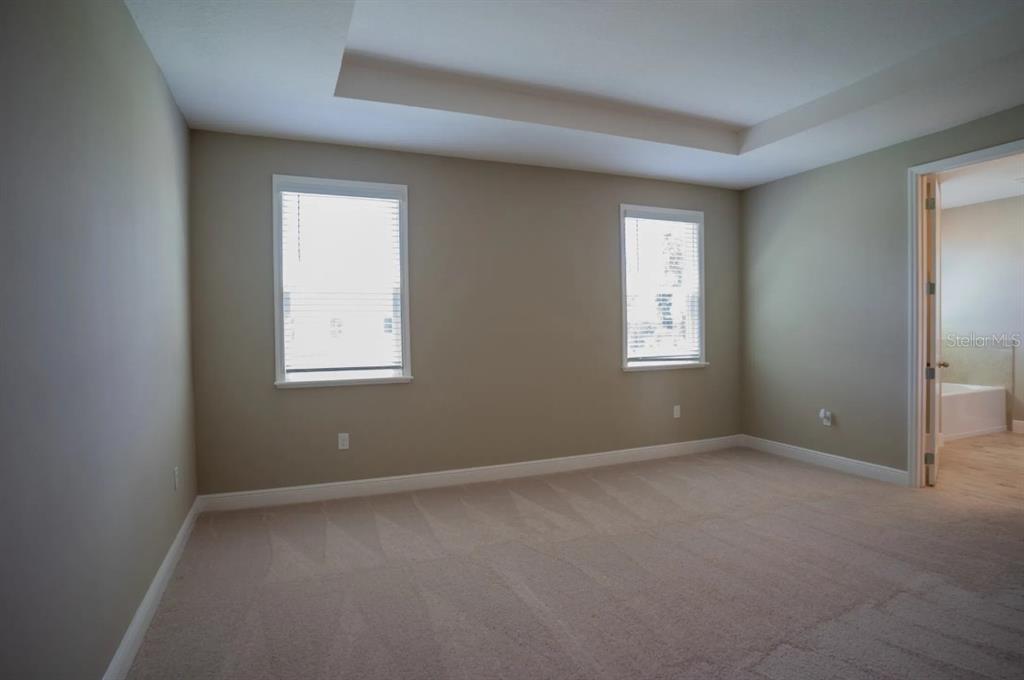 1676 Andover Rdg Drive DeLand, FL 32720 - Photo 9 of 14 an empty room with windows