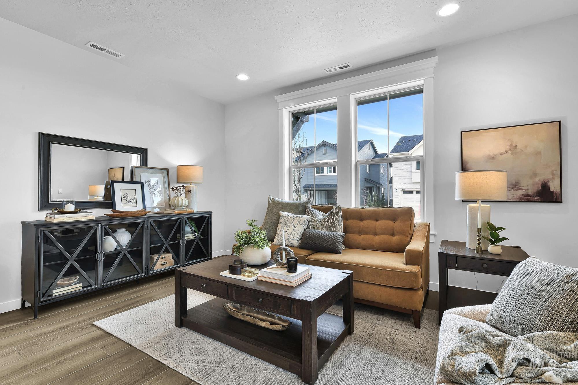 414 South Fritts Avenue Meridian, ID 83642 - Photo 4 of 21 Living room featuring wood finished floors and recessed lighting