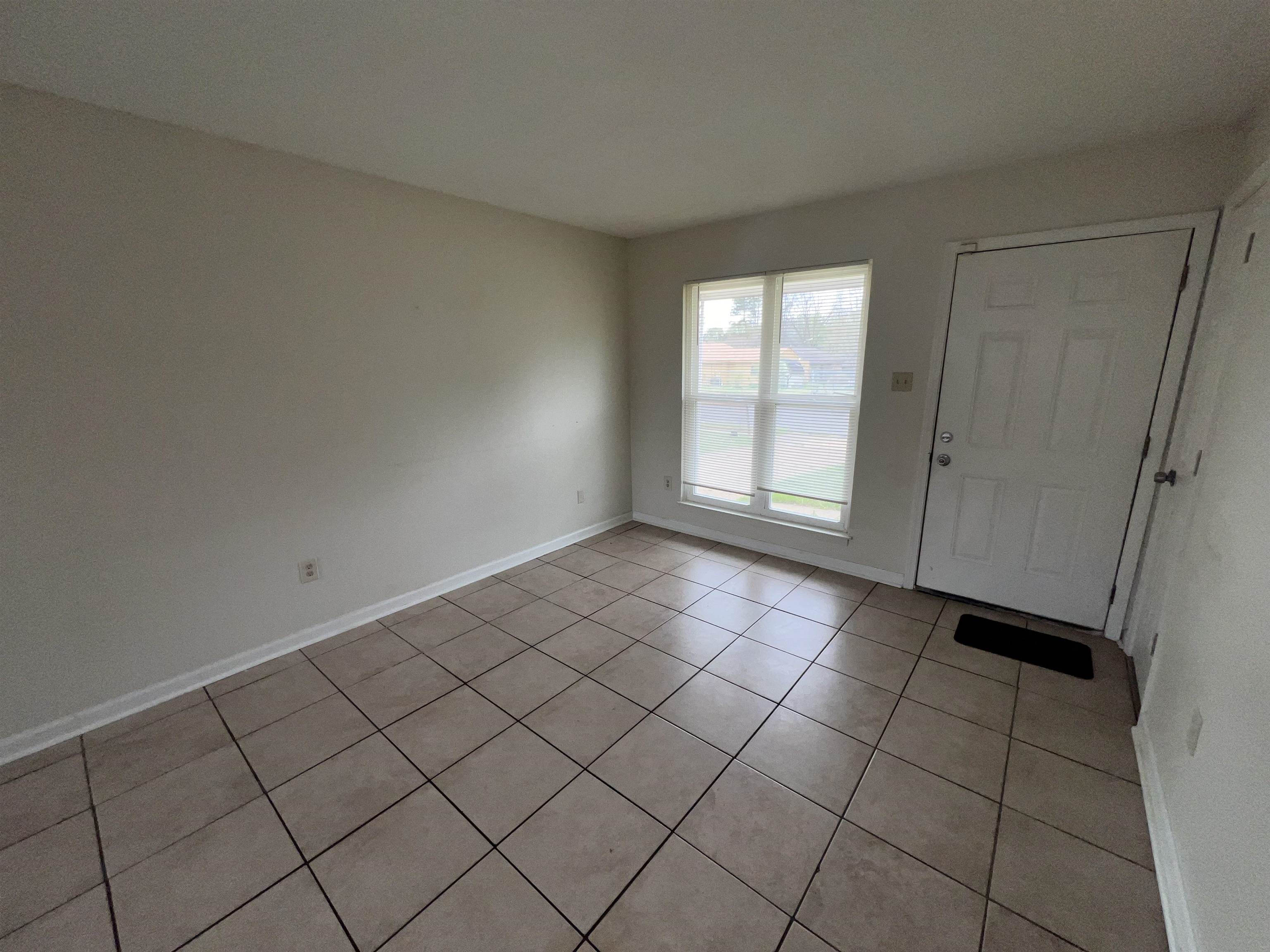 580 Blackhawk Road Memphis, TN 38109 - Photo 3 of 10 a view of an empty room and window