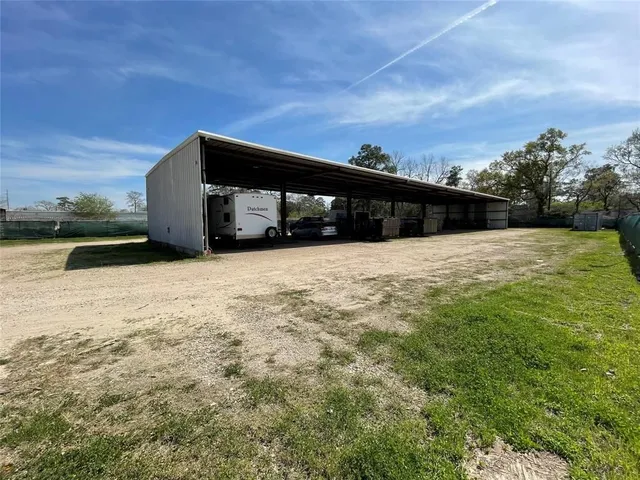 a backyard of a house with lots of green space and fog
