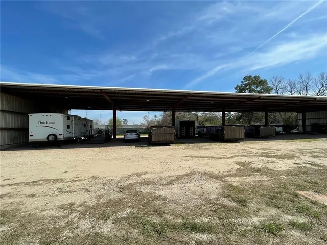 a black car parked in front of a building