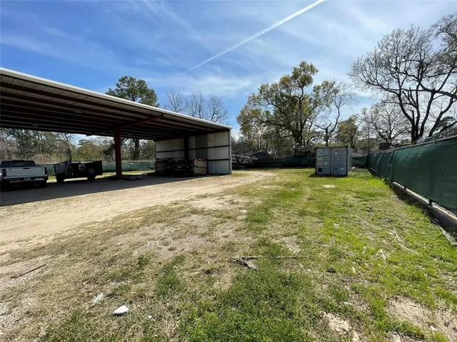 a view of a backyard of a house