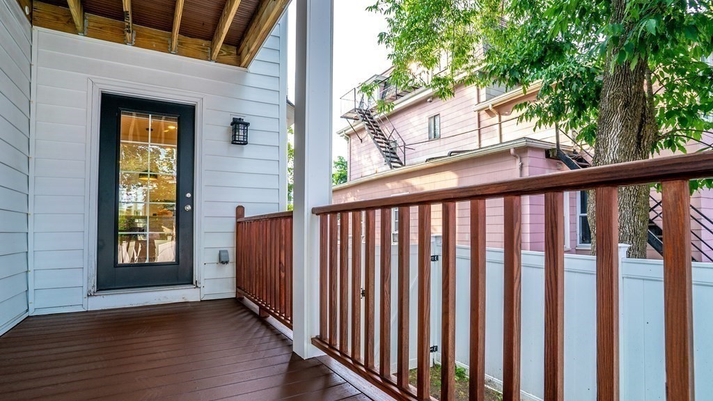 38 Chester Street, Unit 1 Somerville, MA 02144 - Photo 28 of 32 a view of wooden balcony