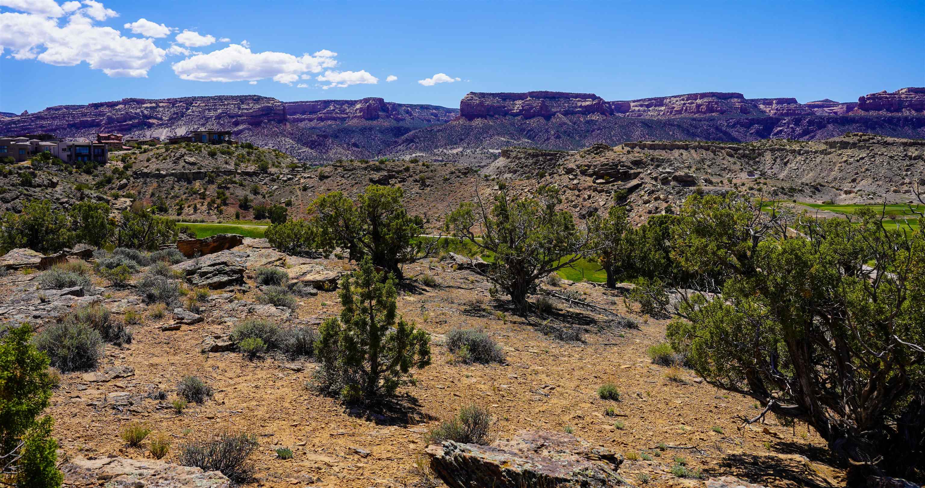 353 High Desert Road Grand Junction, CO 81507 - Photo 12 of 15 a view of a city with mountains in the background