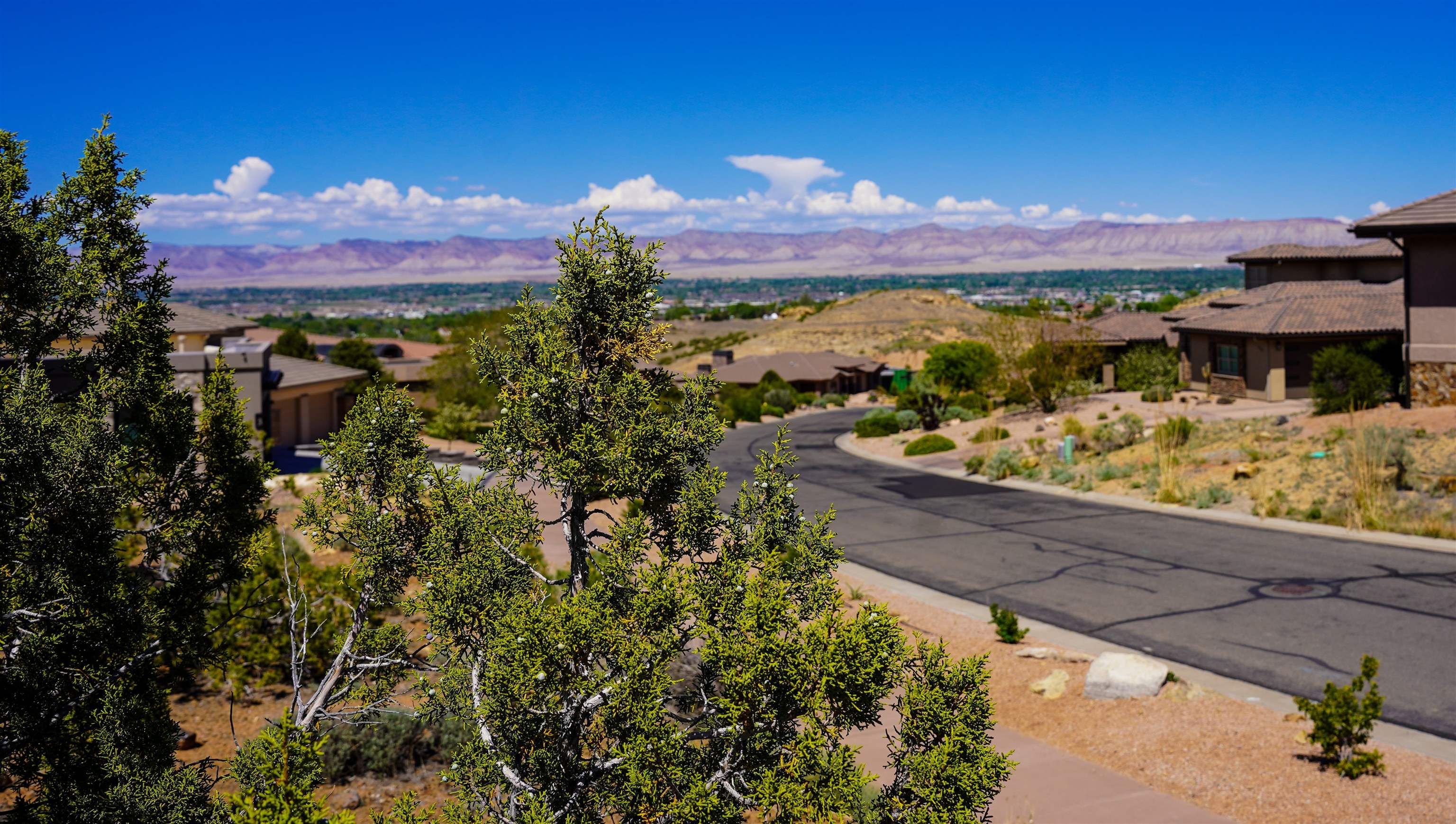 353 High Desert Road Grand Junction, CO 81507 - Photo 2 of 15 a view of a city with swimming pool
