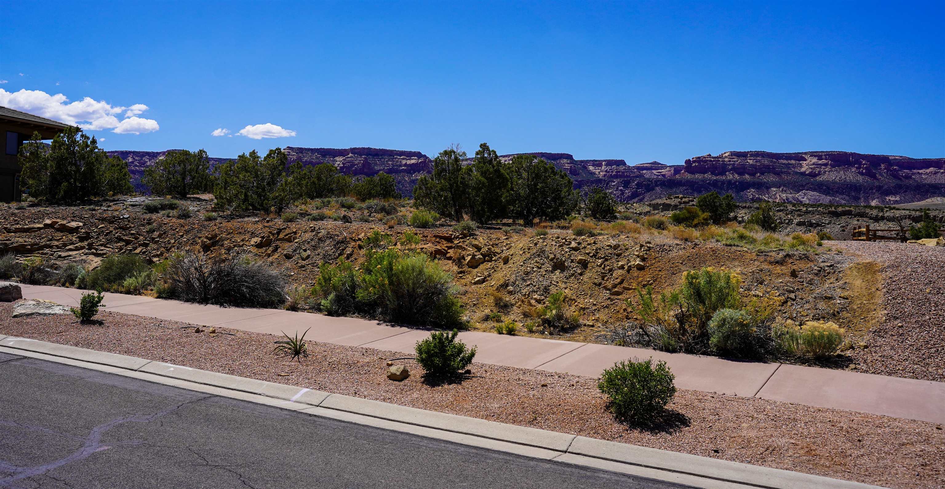 353 High Desert Road Grand Junction, CO 81507 - Photo 3 of 15 a view of a lake with a mountain