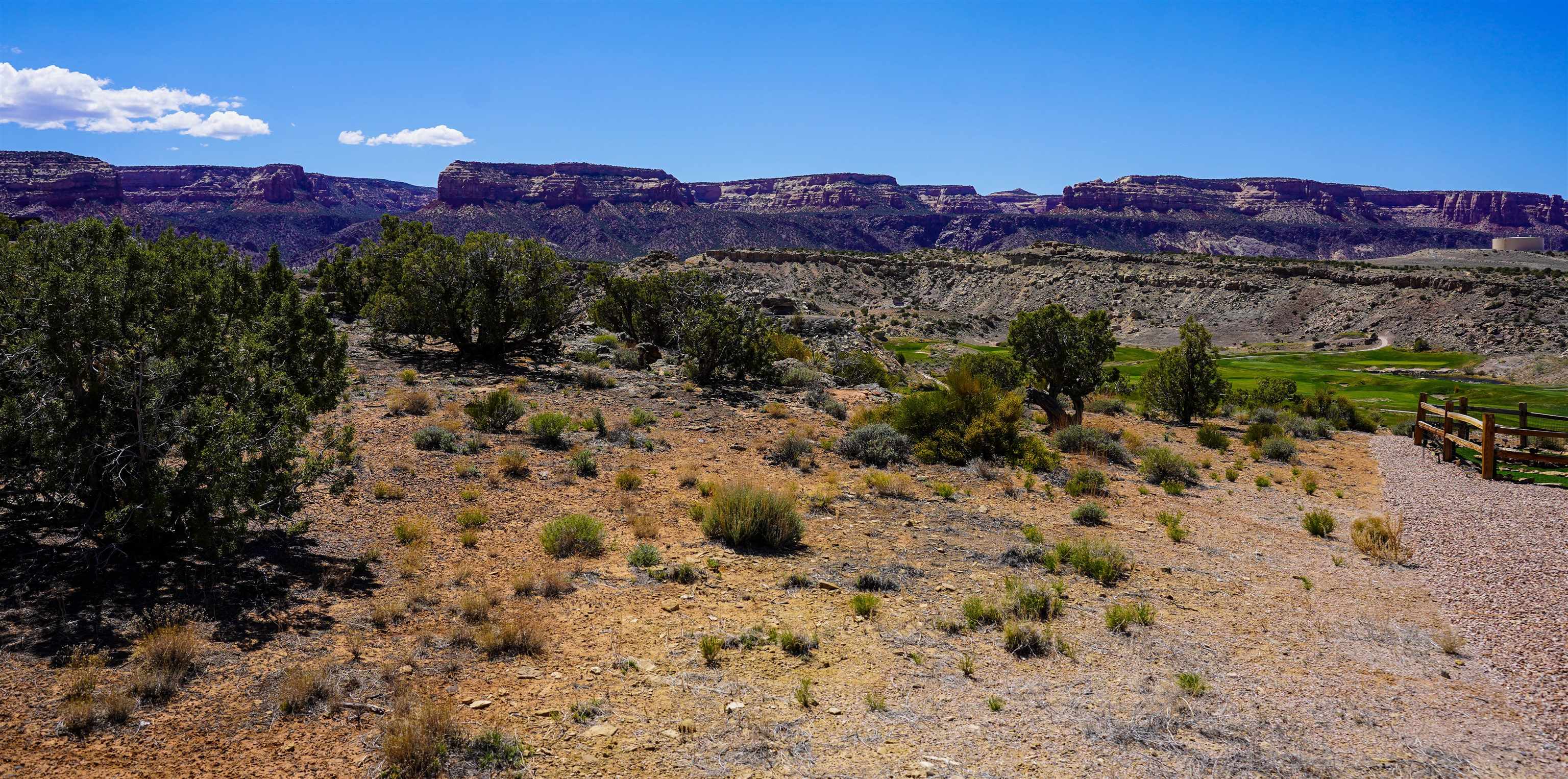 353 High Desert Road Grand Junction, CO 81507 - Photo 7 of 15 a view of a town with mountains in the background