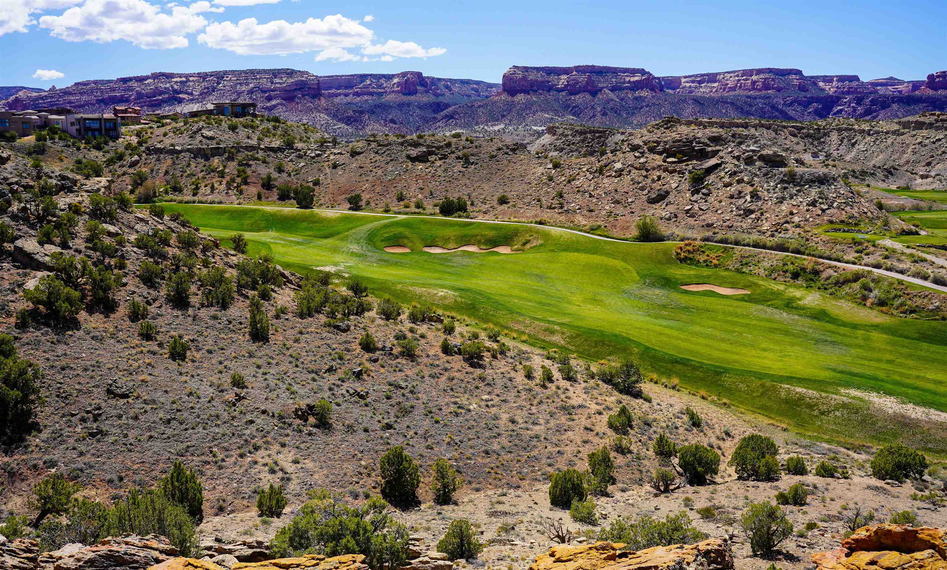 353 High Desert Road Grand Junction, CO 81507 - Photo 8 of 15 a view of a town with mountains in the background