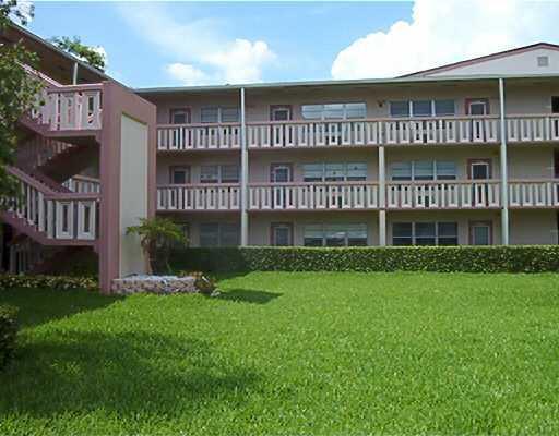 a view of a house with a garden