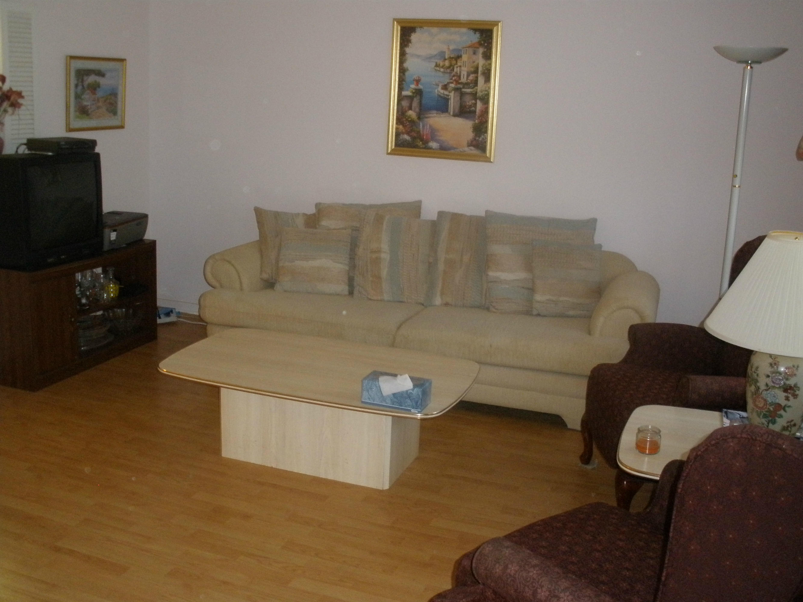 492 Mansfield K Boca Raton, FL 33434 - Photo 2 of 11 a living room with furniture and a flat screen tv