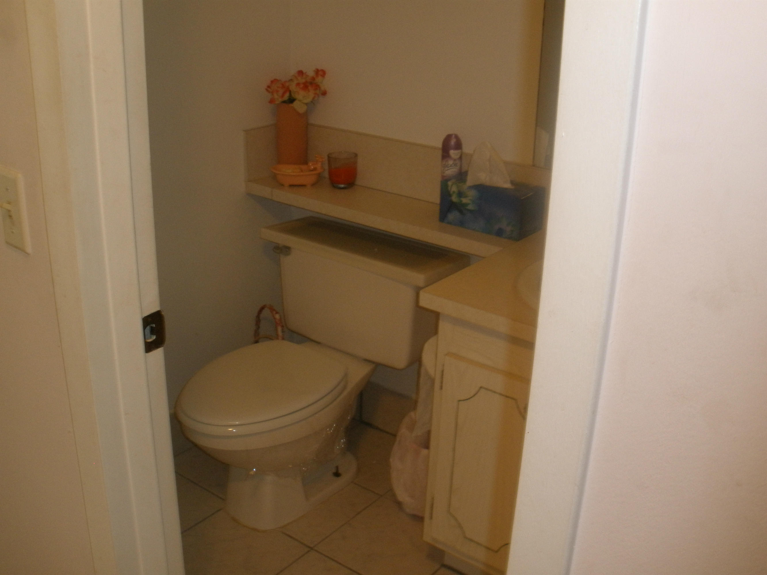 492 Mansfield K Boca Raton, FL 33434 - Photo 7 of 11 a bathroom with a sink and a toilet