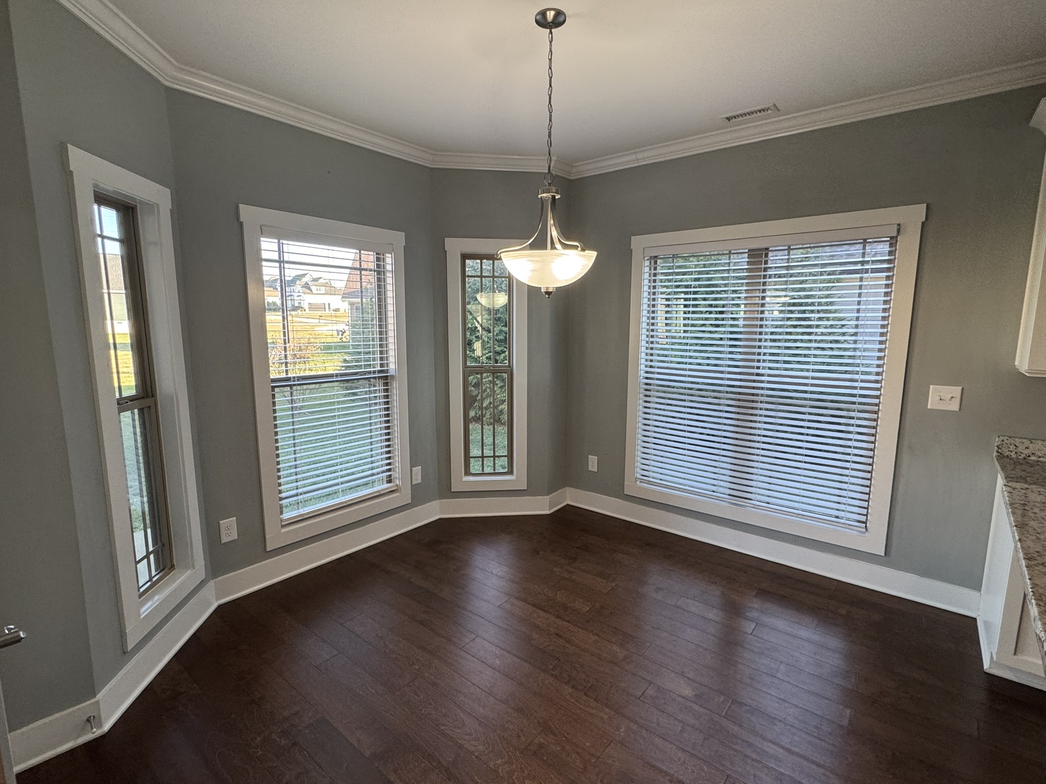 148 ANDERTON Drive Winchester, TN 37398 - Photo 3 of 16 a view of an empty room with wooden floor and a window