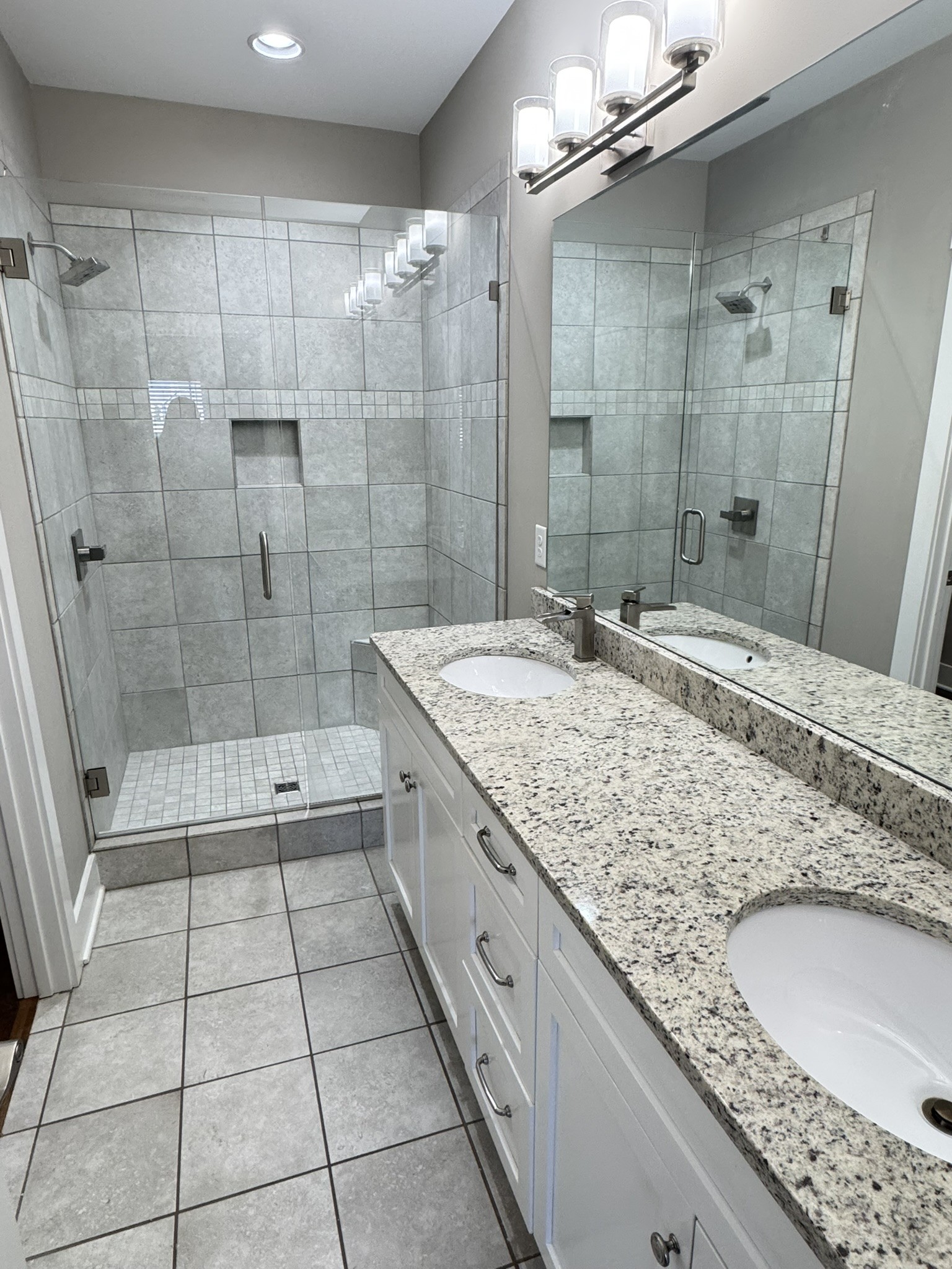 148 ANDERTON Drive Winchester, TN 37398 - Photo 7 of 16 a bathroom with a granite countertop sink a toilet and shower