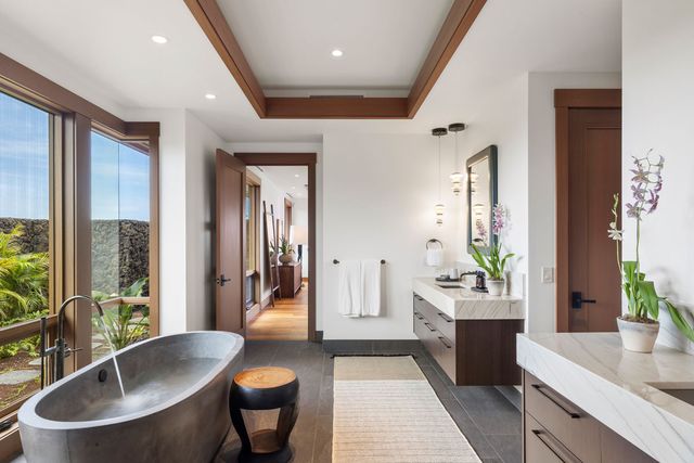 a large living room with large windows