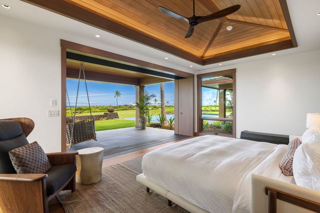 a bed room with a bed and a couch