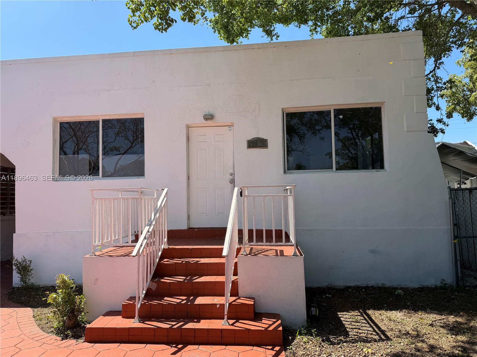 a view of entryway with a front door