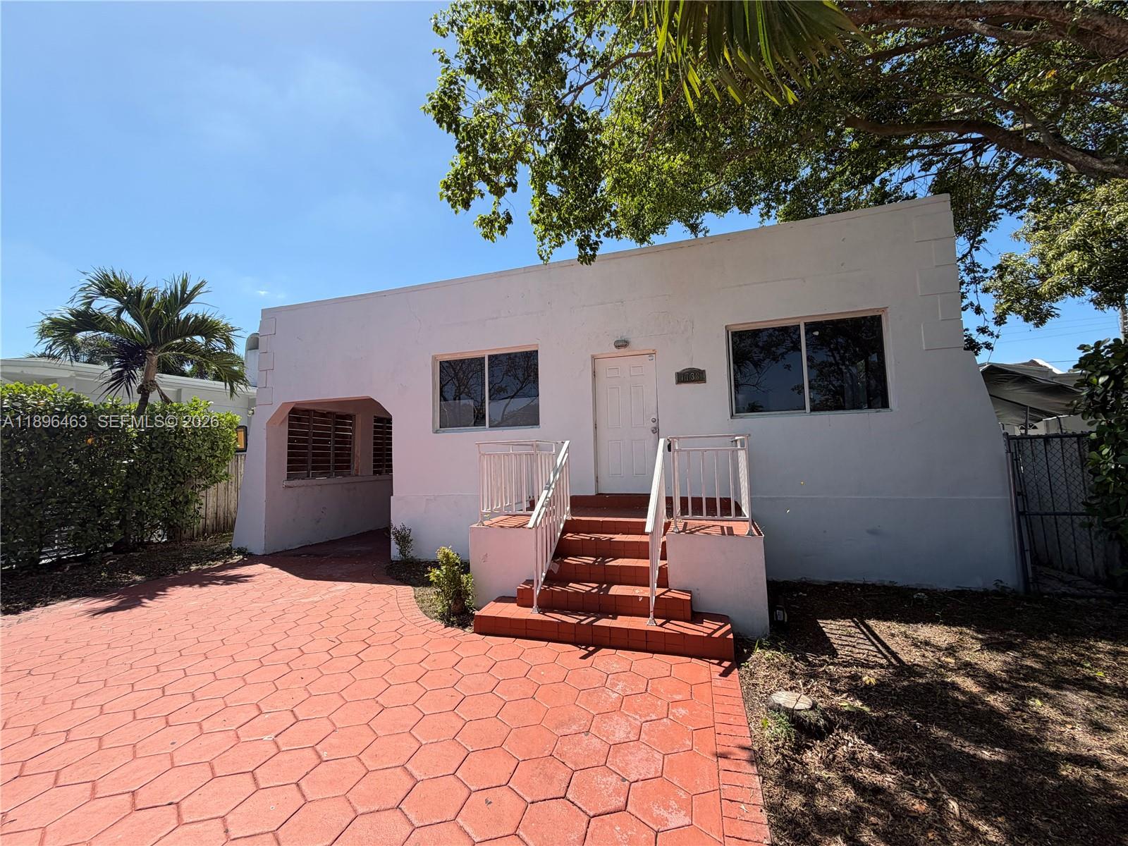 1738 Southwest 17th Street Miami, FL 33145 - Photo 19 of 29 a backyard of a house with seating space