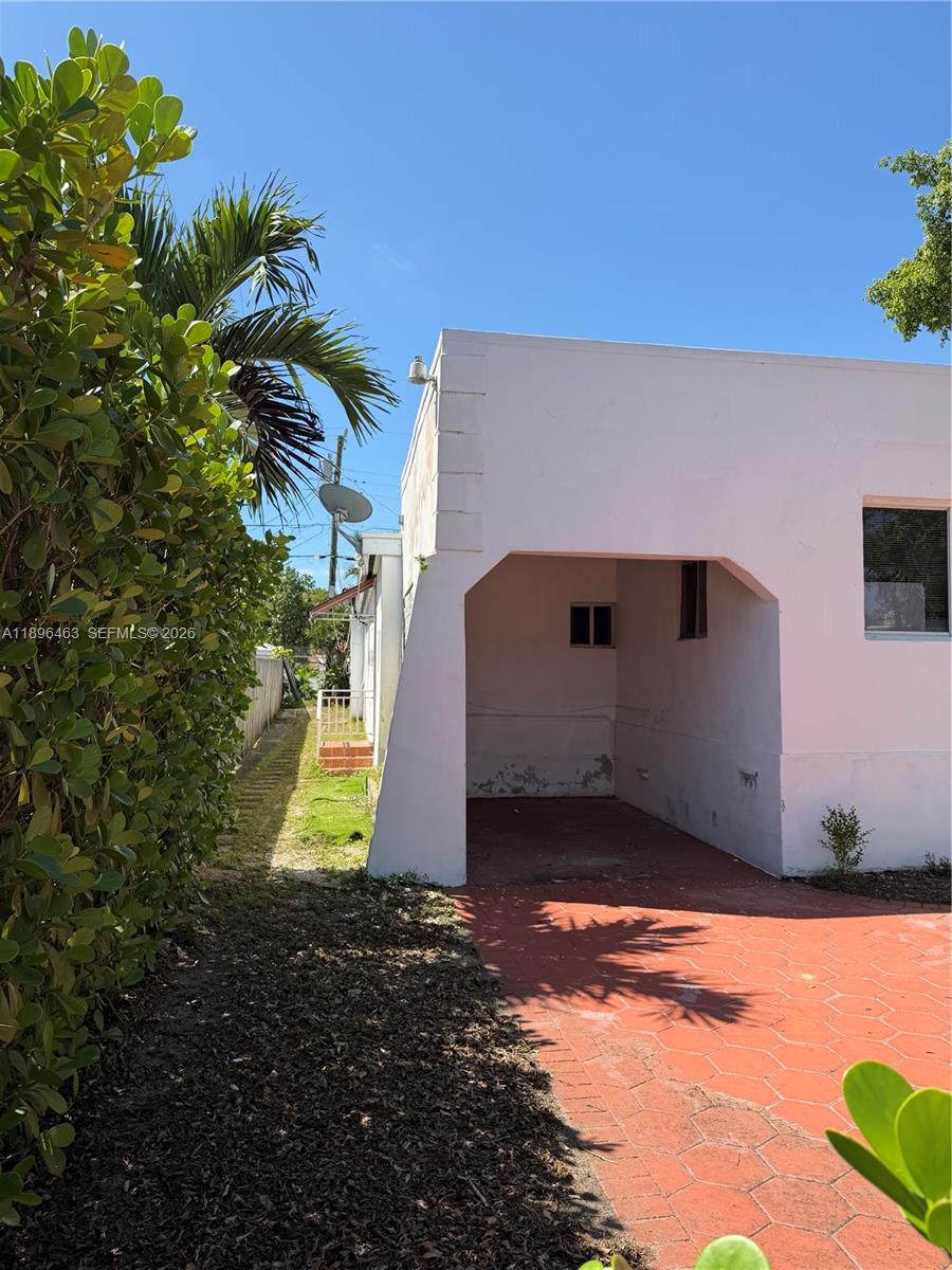 1738 Southwest 17th Street Miami, FL 33145 - Photo 22 of 29 a front view of a house with a yard