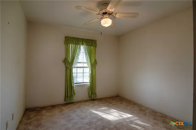 a house view with swimming pool