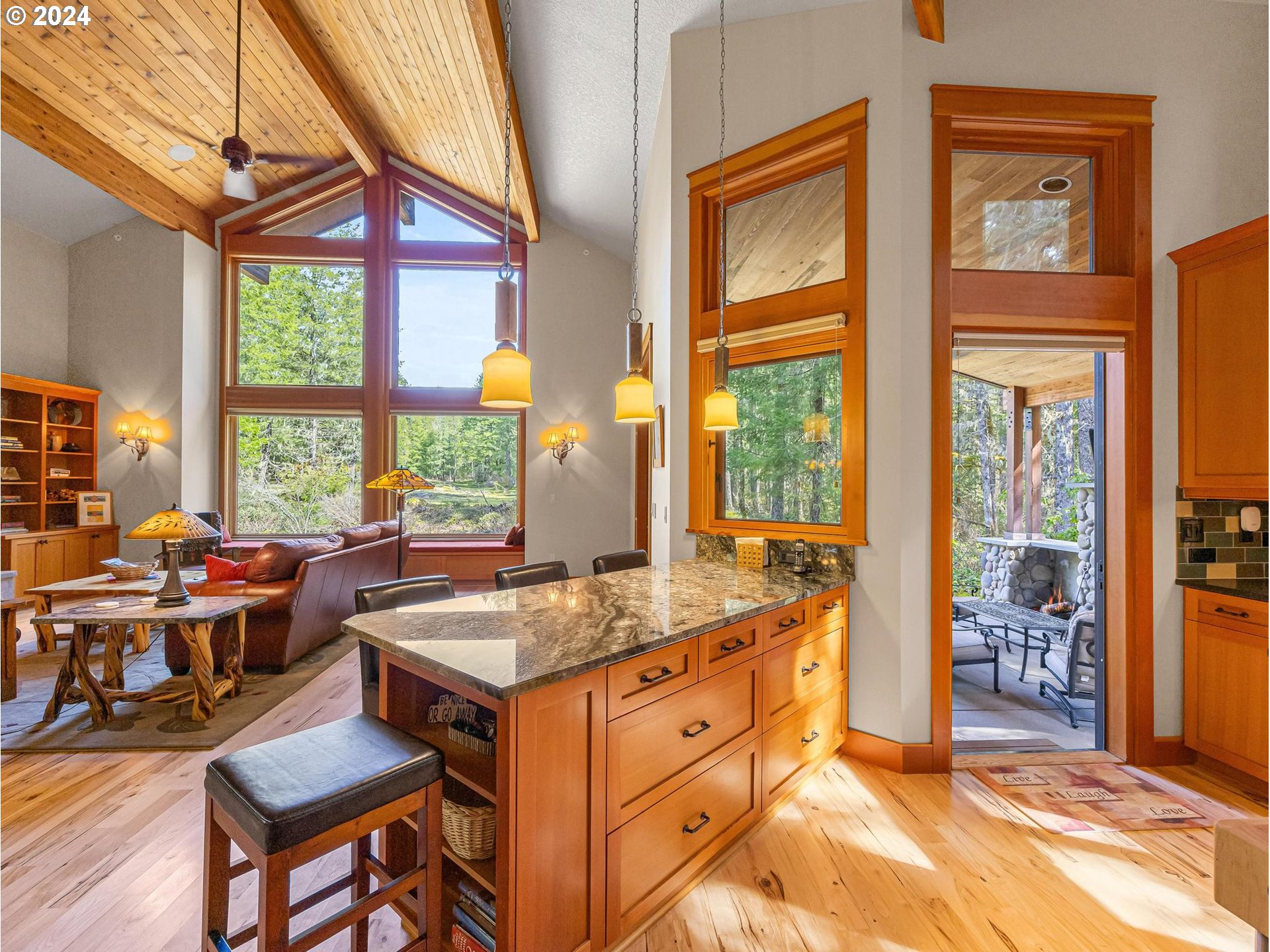 20803 East Glacier View Road Rhododendron, OR 97049 - Photo 15 of 48 a room with furniture and large windows