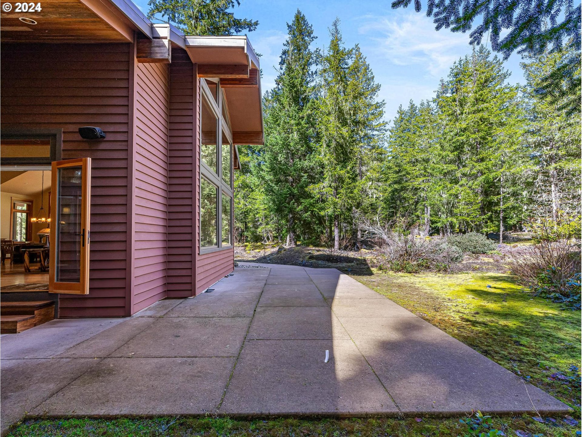 20803 East Glacier View Road Rhododendron, OR 97049 - Photo 36 of 48 a view of a house with backyard and sitting area