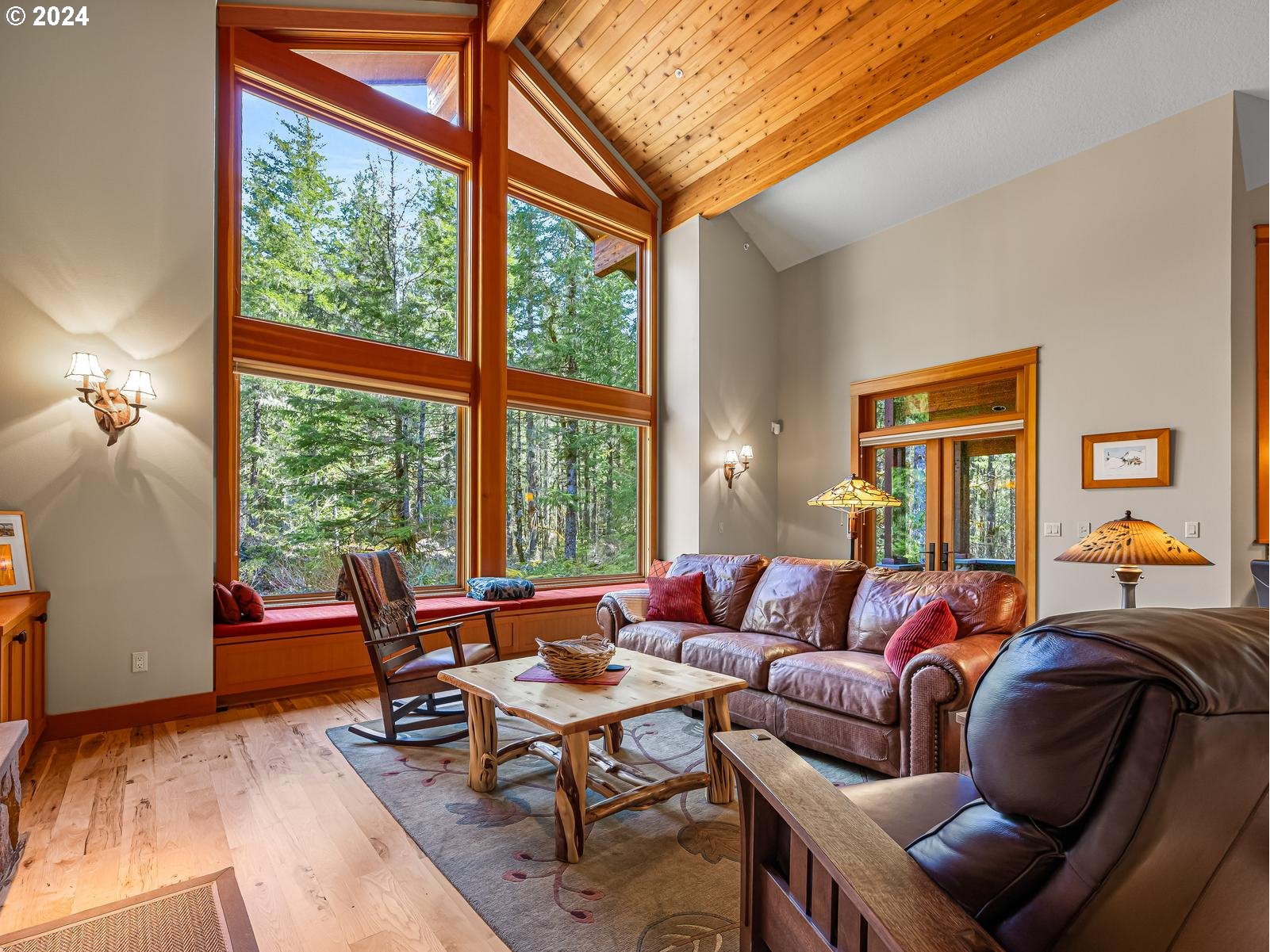 20803 East Glacier View Road Rhododendron, OR 97049 - Photo 7 of 48 a living room with furniture and a large window