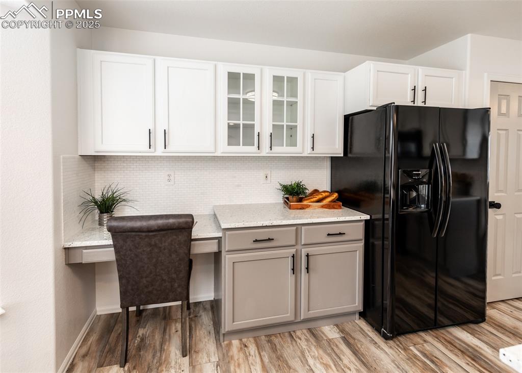 508 Fox Run Circle Colorado Springs, CO 80921 - Photo 11 of 50 a kitchen with stainless steel appliances granite countertop a refrigerator and a stove top oven