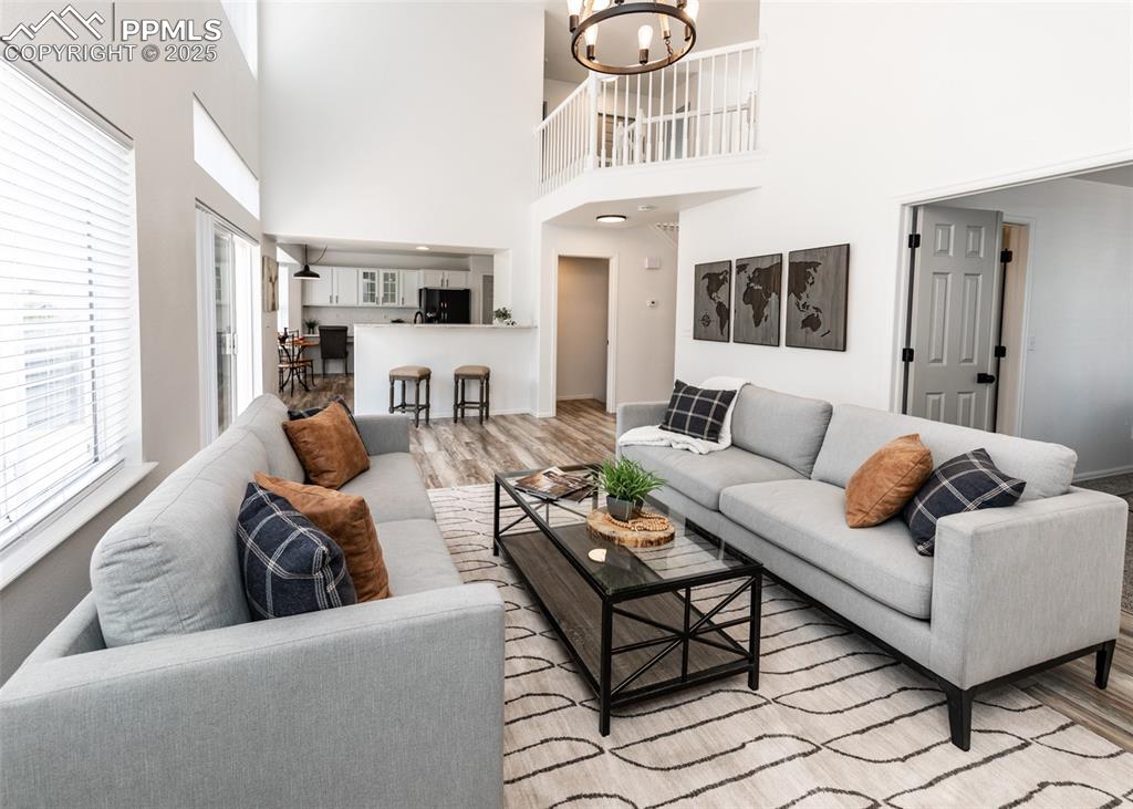 508 Fox Run Circle Colorado Springs, CO 80921 - Photo 17 of 50 a living room with furniture and a large window
