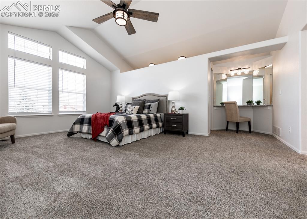 508 Fox Run Circle Colorado Springs, CO 80921 - Photo 31 of 50 a living room with furniture and a chandelier
