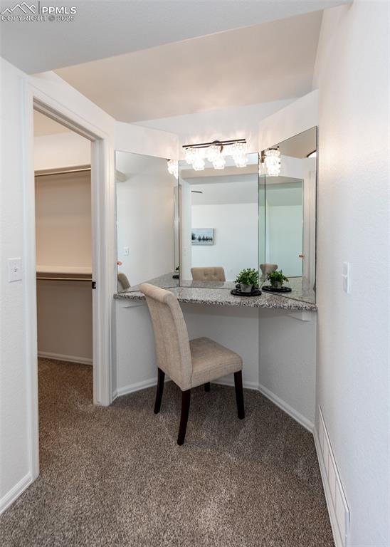 508 Fox Run Circle Colorado Springs, CO 80921 - Photo 34 of 50 a room with table chair and wooden floor