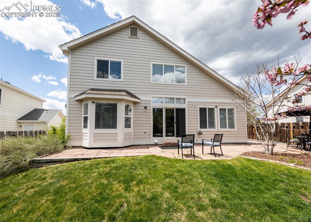 508 Fox Run Circle Colorado Springs, CO 80921 - Photo 48 of 50 a front view of house with yard and outdoor seating