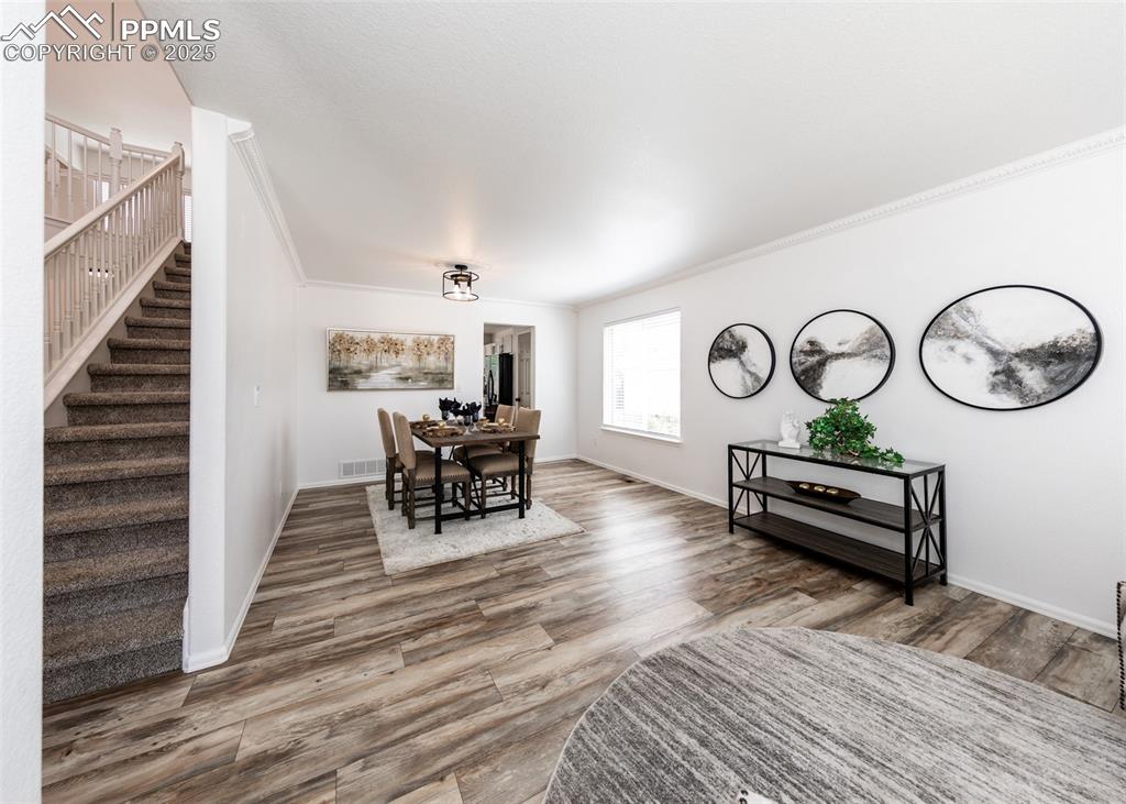 508 Fox Run Circle Colorado Springs, CO 80921 - Photo 6 of 50 a living room with furniture and a wooden floor
