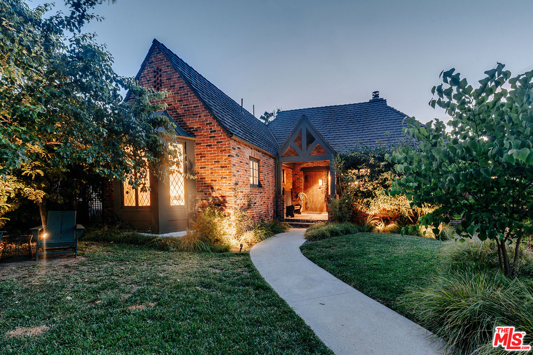 1341 Edgecliffe Drive Los Angeles, CA 90026 - Photo 1 of 51 a front view of a house with a yard