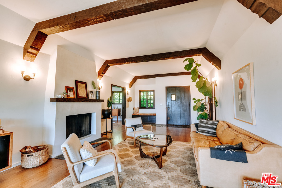 1341 Edgecliffe Drive Los Angeles, CA 90026 - Photo 13 of 51 a living room with furniture and a fireplace
