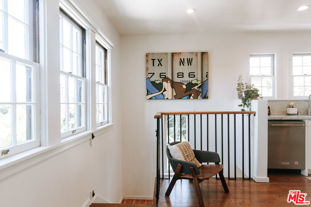 1341 Edgecliffe Drive Los Angeles, CA 90026 - Photo 20 of 51 a view of a hallway with furniture and a window