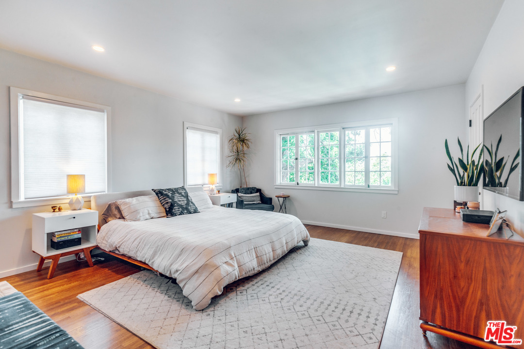 1341 Edgecliffe Drive Los Angeles, CA 90026 - Photo 21 of 51 a bedroom with a large bed and a window