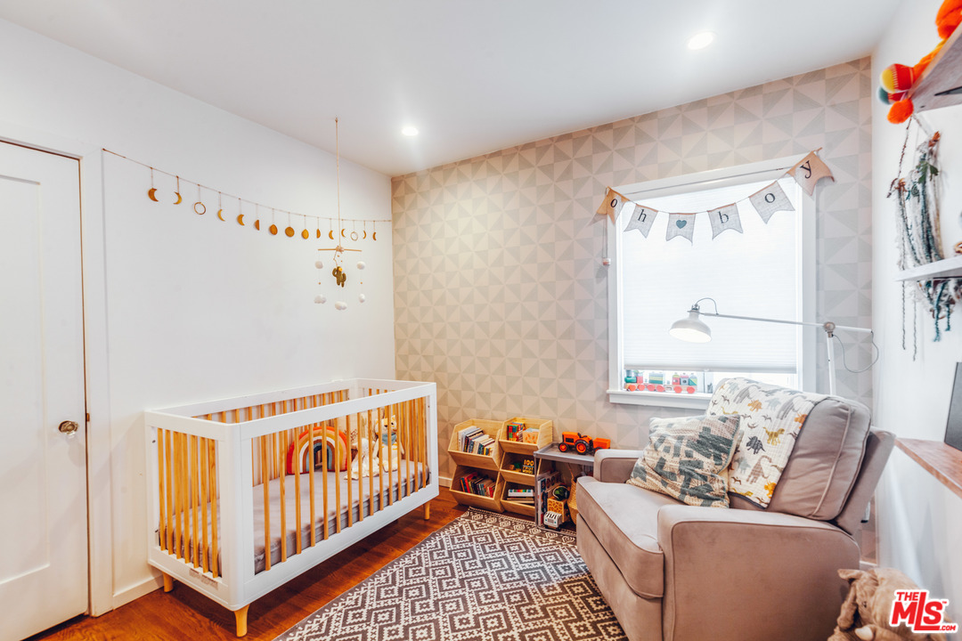 1341 Edgecliffe Drive Los Angeles, CA 90026 - Photo 30 of 51 a bedroom with furniture and a window