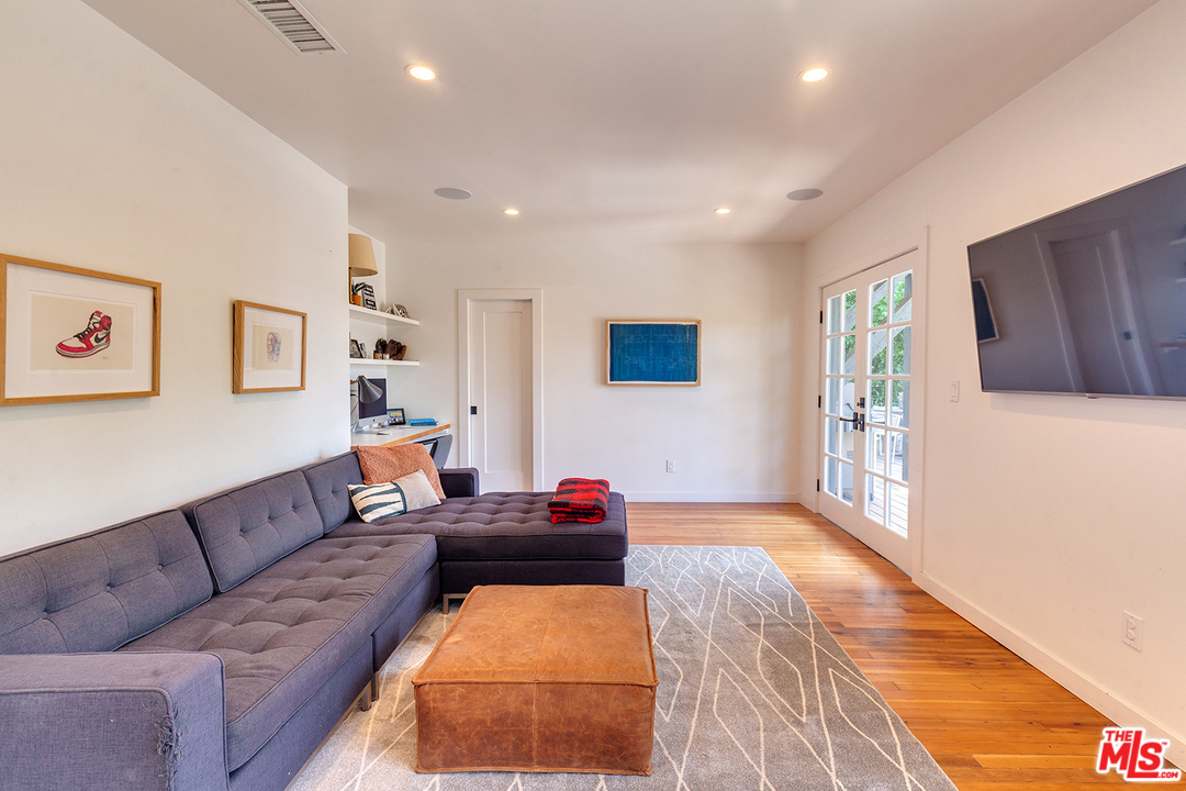 1341 Edgecliffe Drive Los Angeles, CA 90026 - Photo 33 of 51 a living room with furniture and a flat screen tv