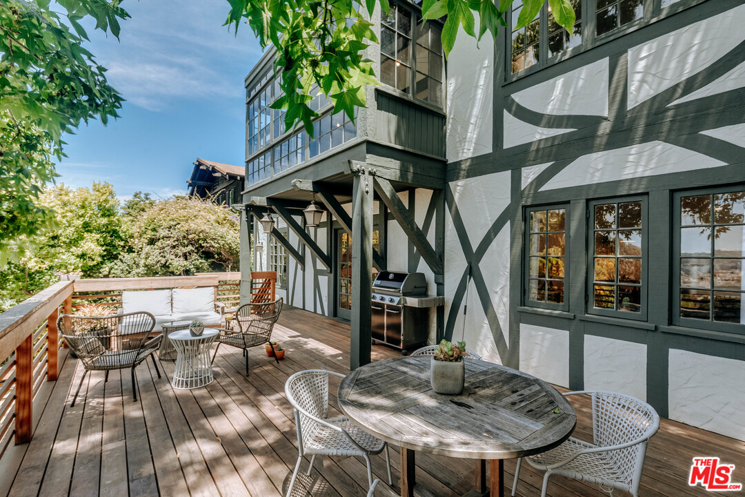 1341 Edgecliffe Drive Los Angeles, CA 90026 - Photo 36 of 51 a view of house with roof deck and furniture