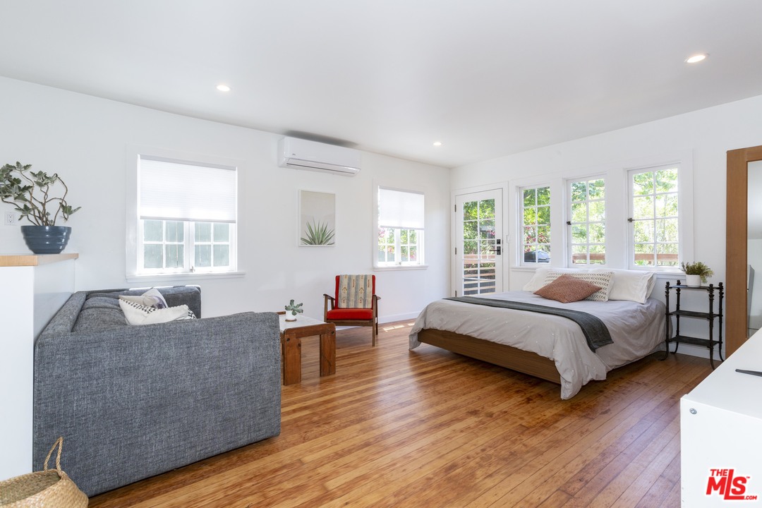 1341 Edgecliffe Drive Los Angeles, CA 90026 - Photo 47 of 51 a living room with furniture and a large window